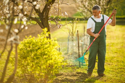Low-carbon electric van making a garden waste collection